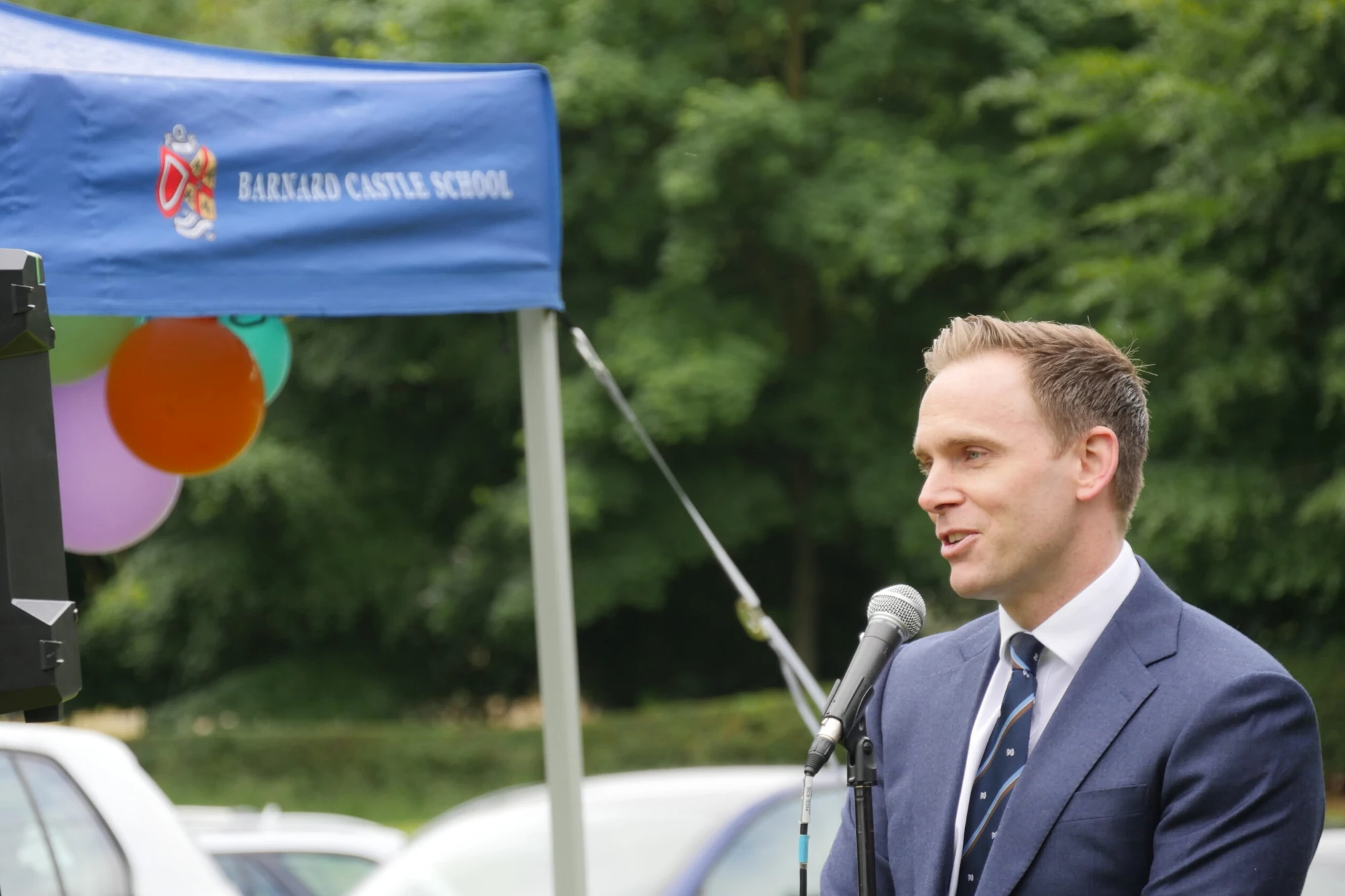 Mr Cresswell, who officially opened the Prep School Summer Fayre, addressing guests at the event.