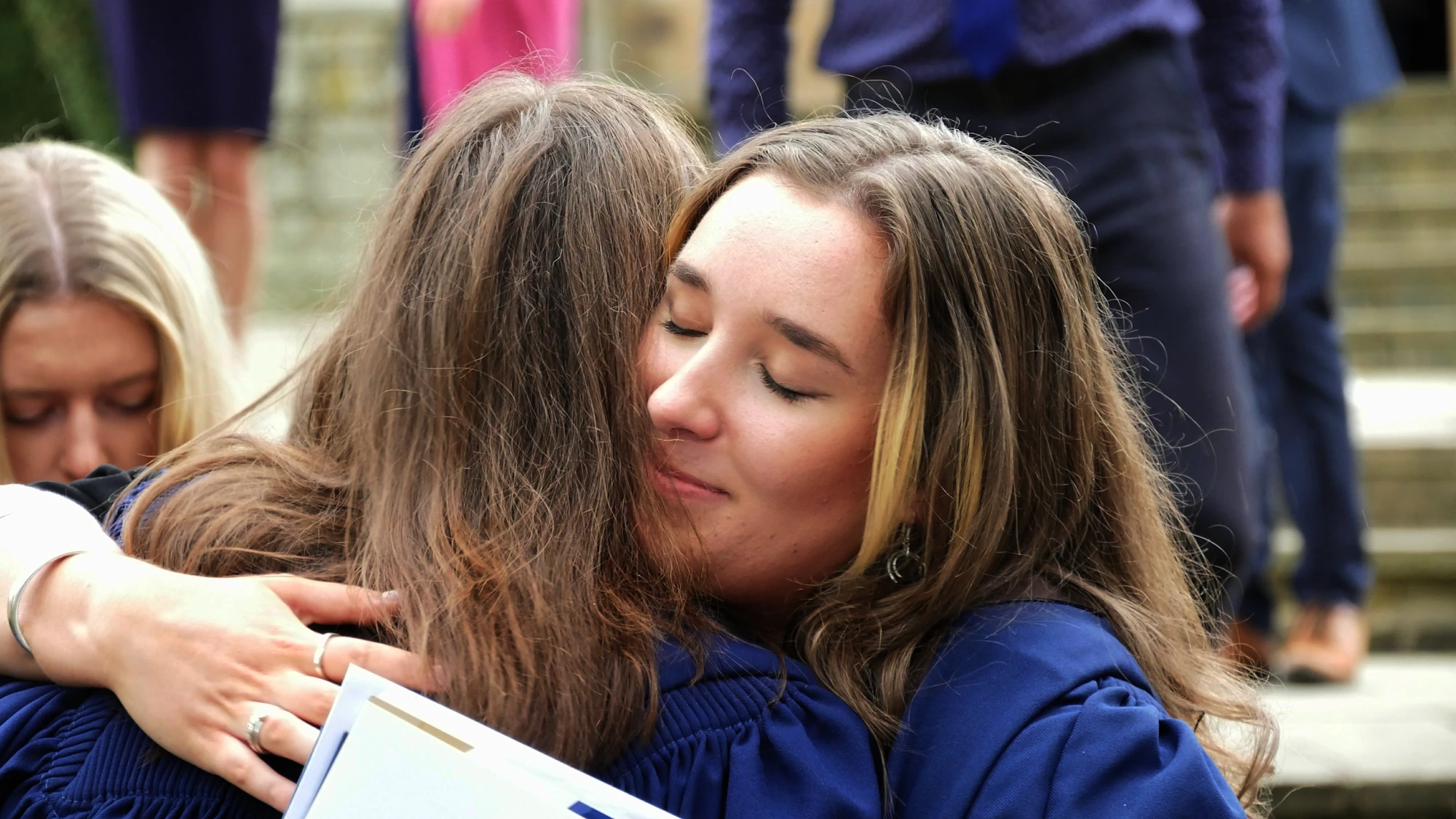 A Barnard Castle School pupil hugging someone dear to them.