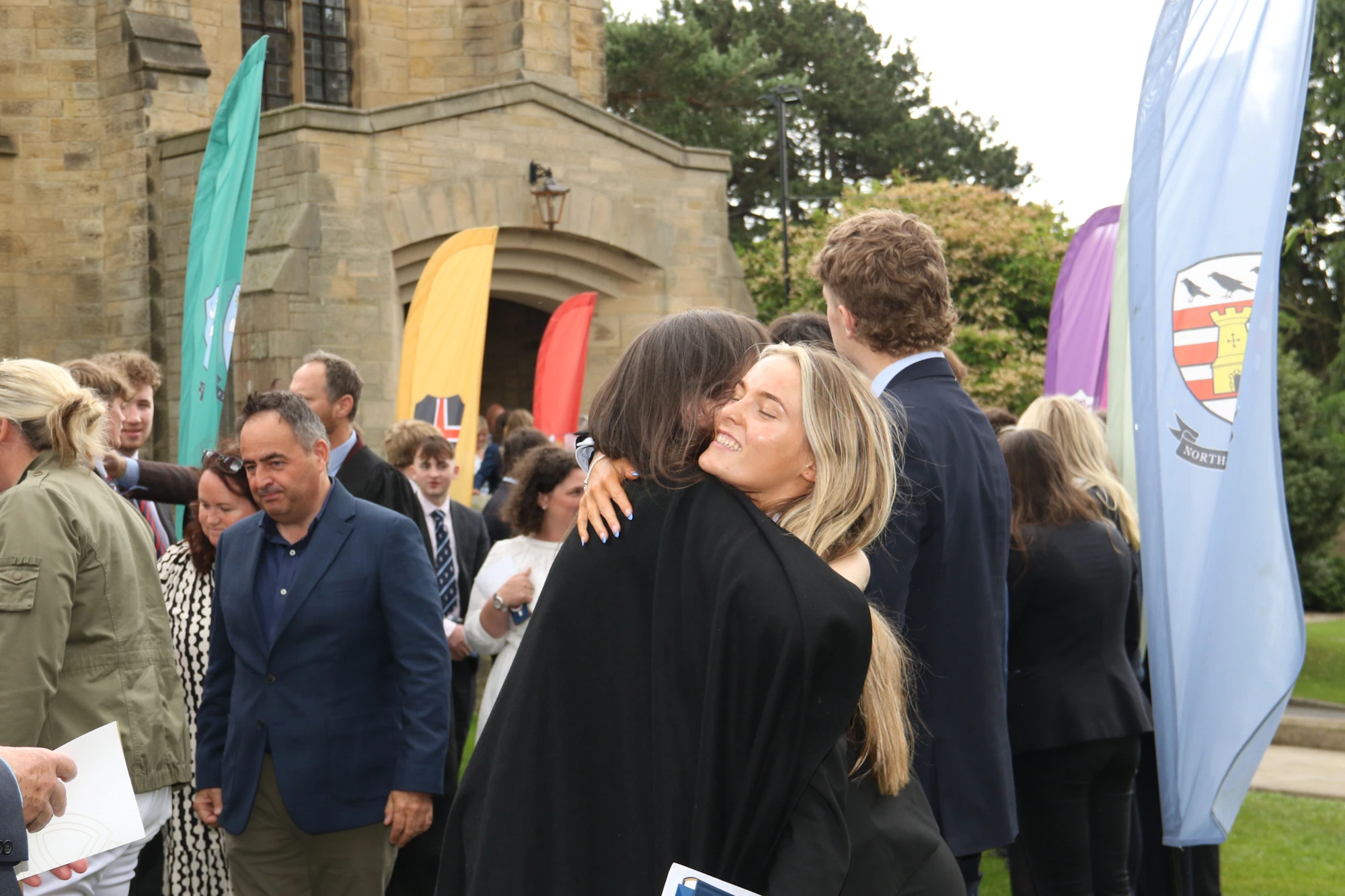 Barnard Castle School pupil hugging someone