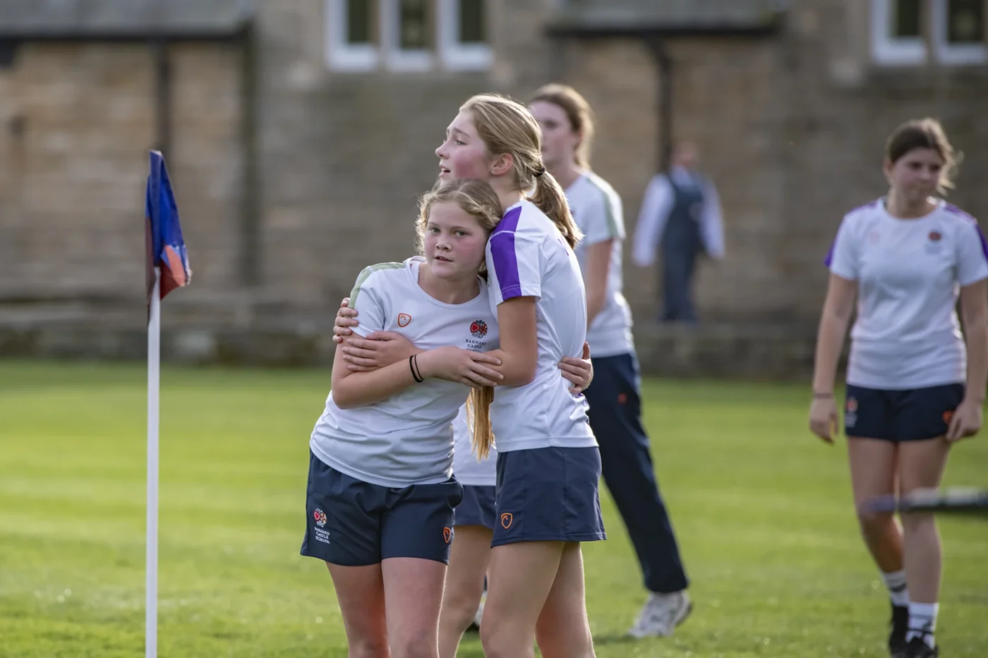 Barnard Castle School pupils in the Barney Bash hugging