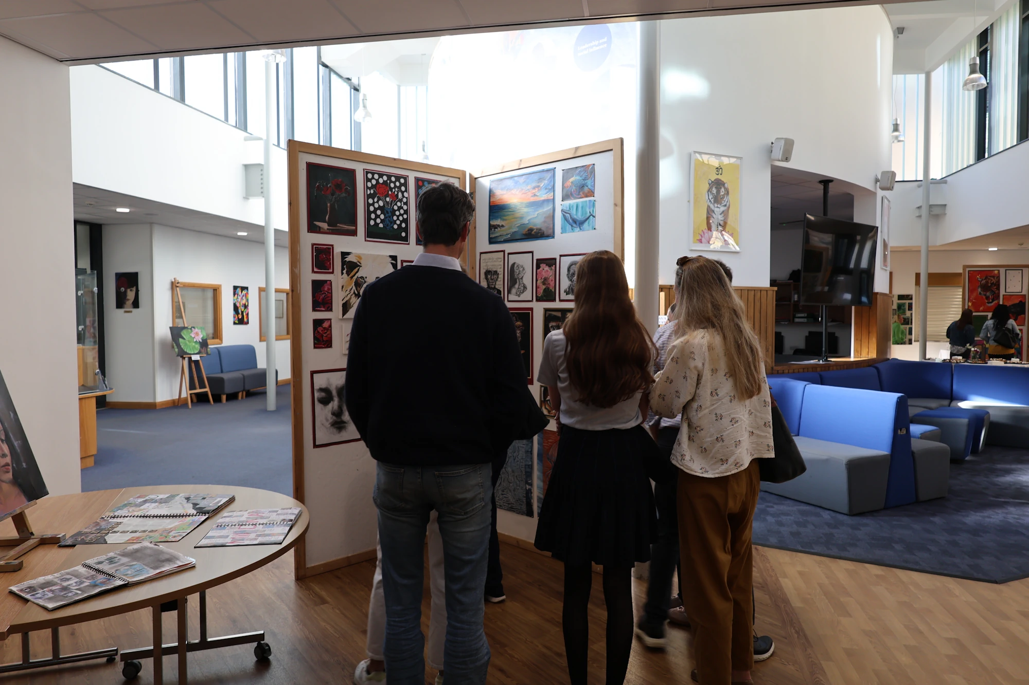 Barnard Castle School parents at an art exhibition.