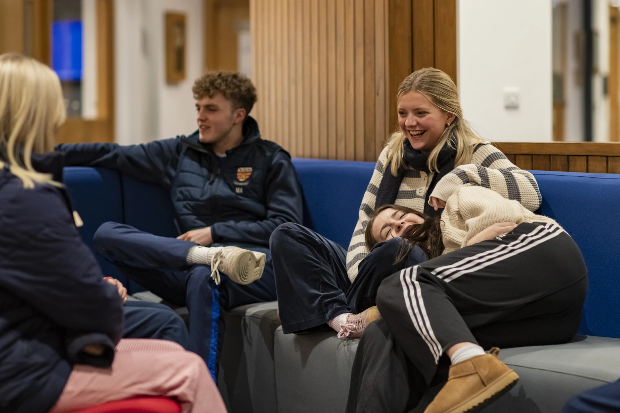 Barnard Castle School boarding pupils sitting together.