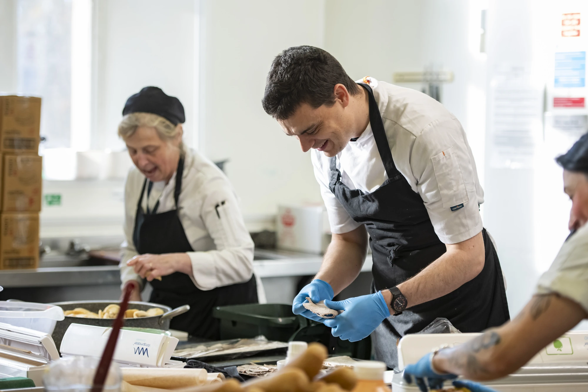 Barnard Castle School kitchen team cooking.