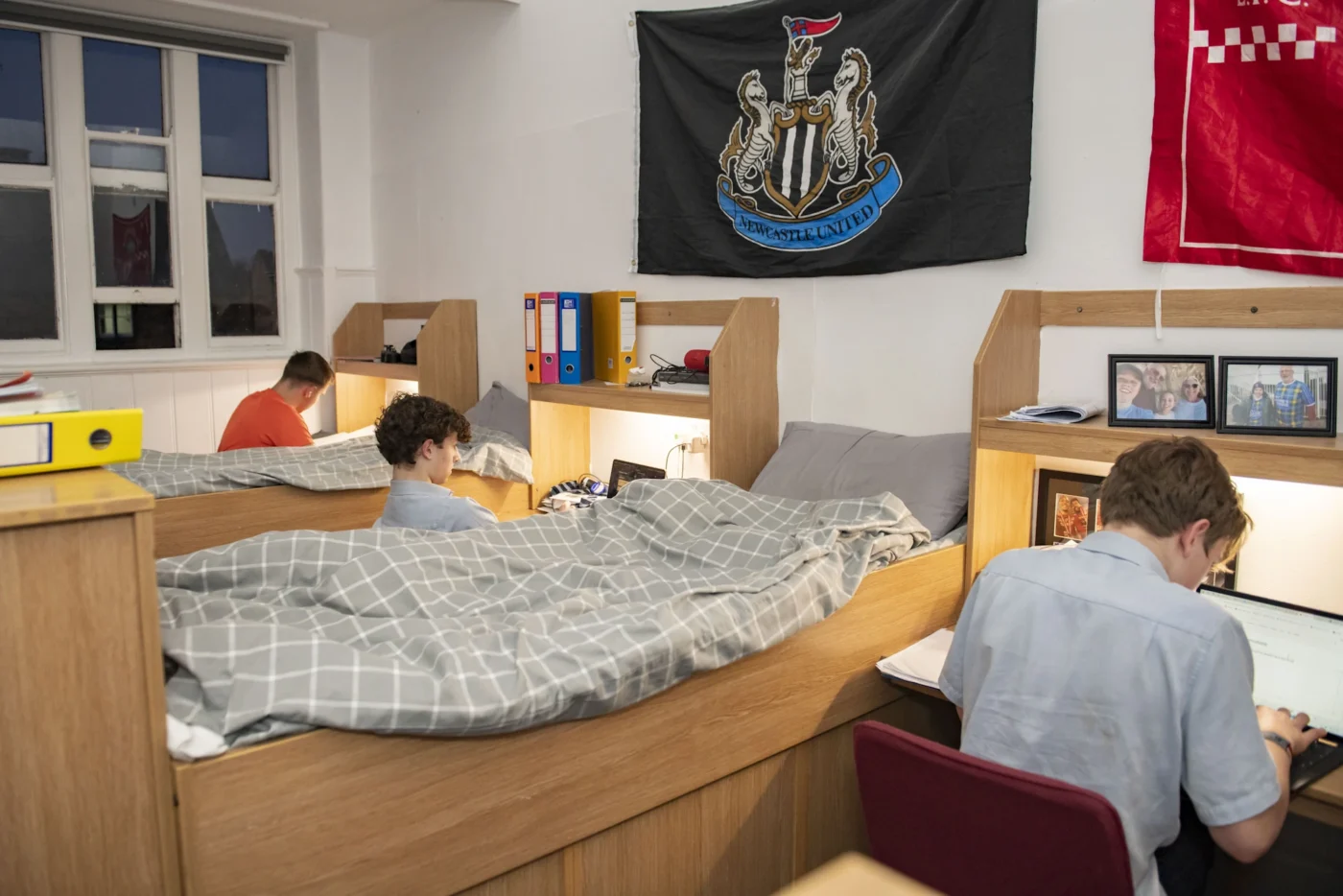 Barnard Castle School boarding pupils working in their room.