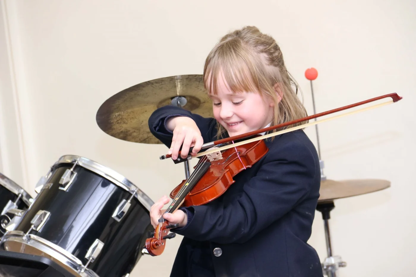 A Barnard Castle School Prep pupil playing the violin.
