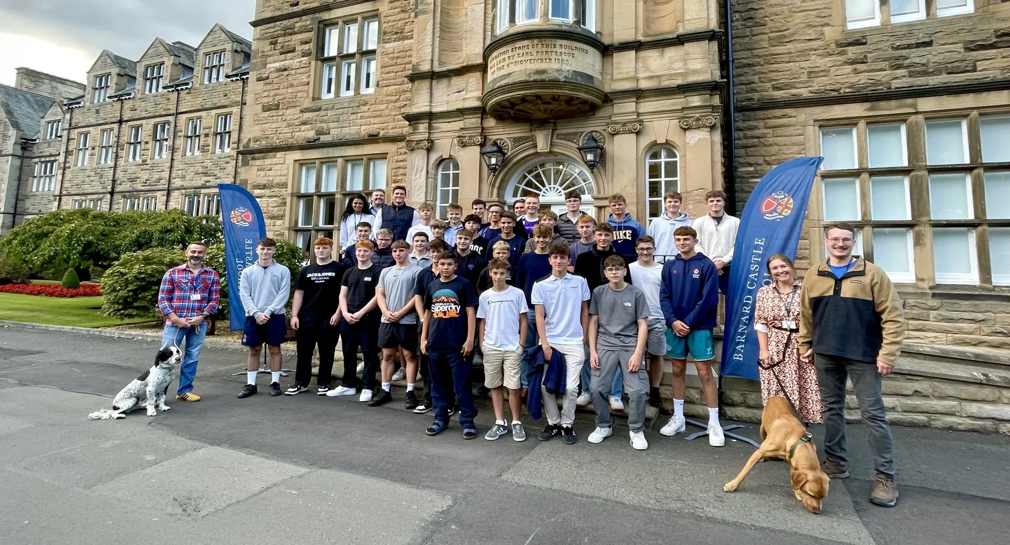 Big group of international students stood outside of Barnard Castle School.