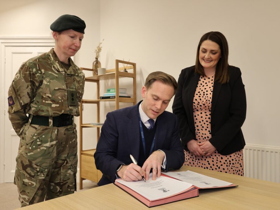 Barney signs the Armed Forces Covenant
