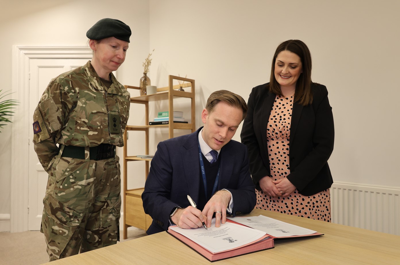 Barney signs the Armed Forces Covenant