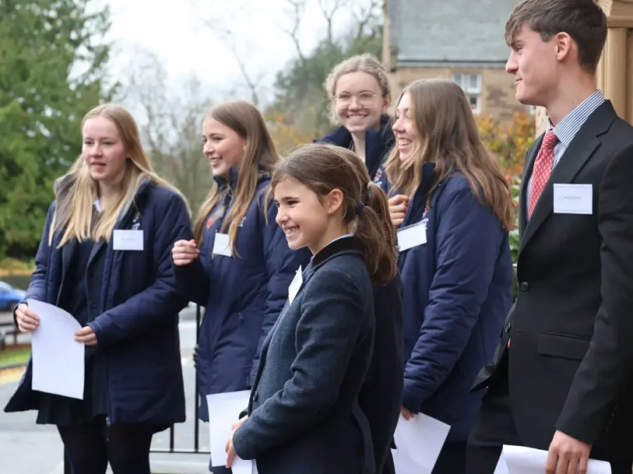 Students waiting to greet international agents