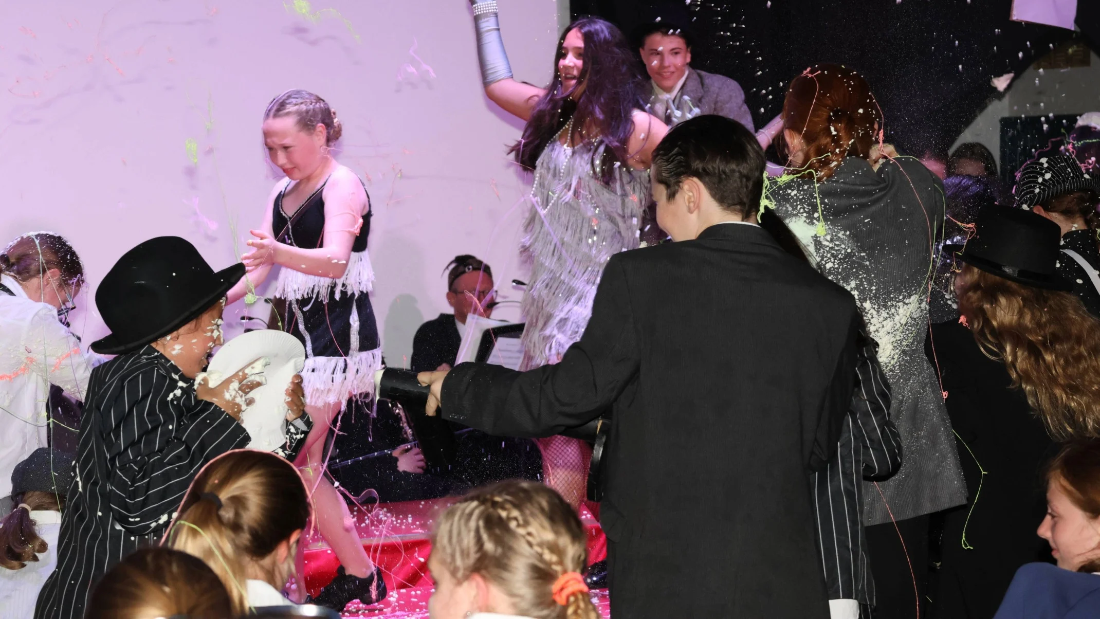 A chaotic moment during Barney's production of Bugsy Malone.