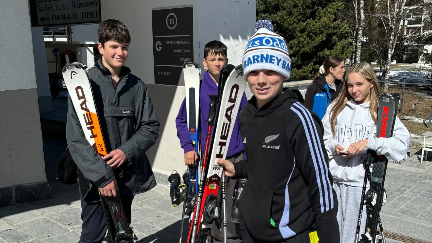A group of boys from Barney wearing their ski gear.