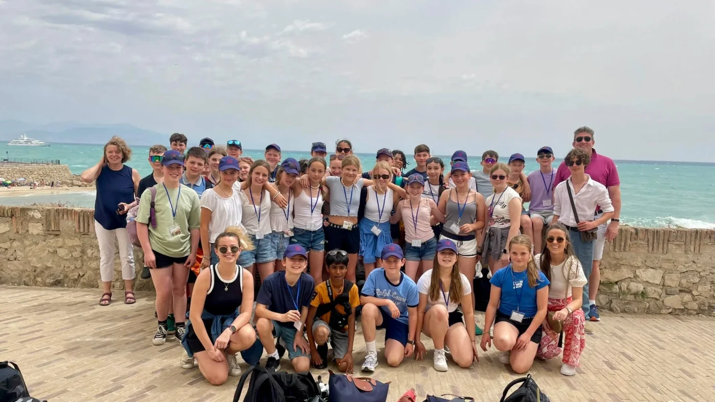 A large group of Barney students on the French coast.