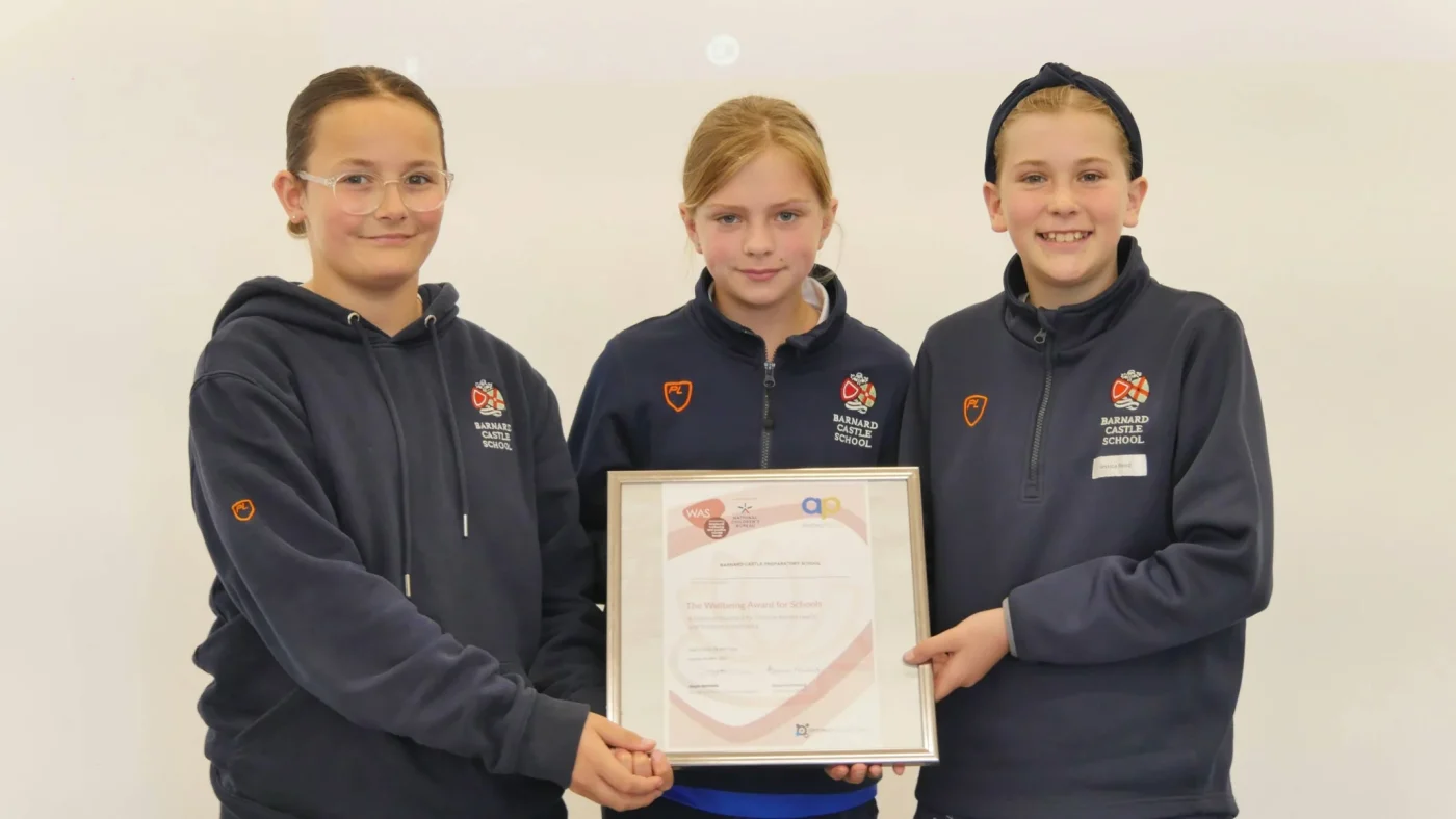 Barney Prep School students posing with their award.