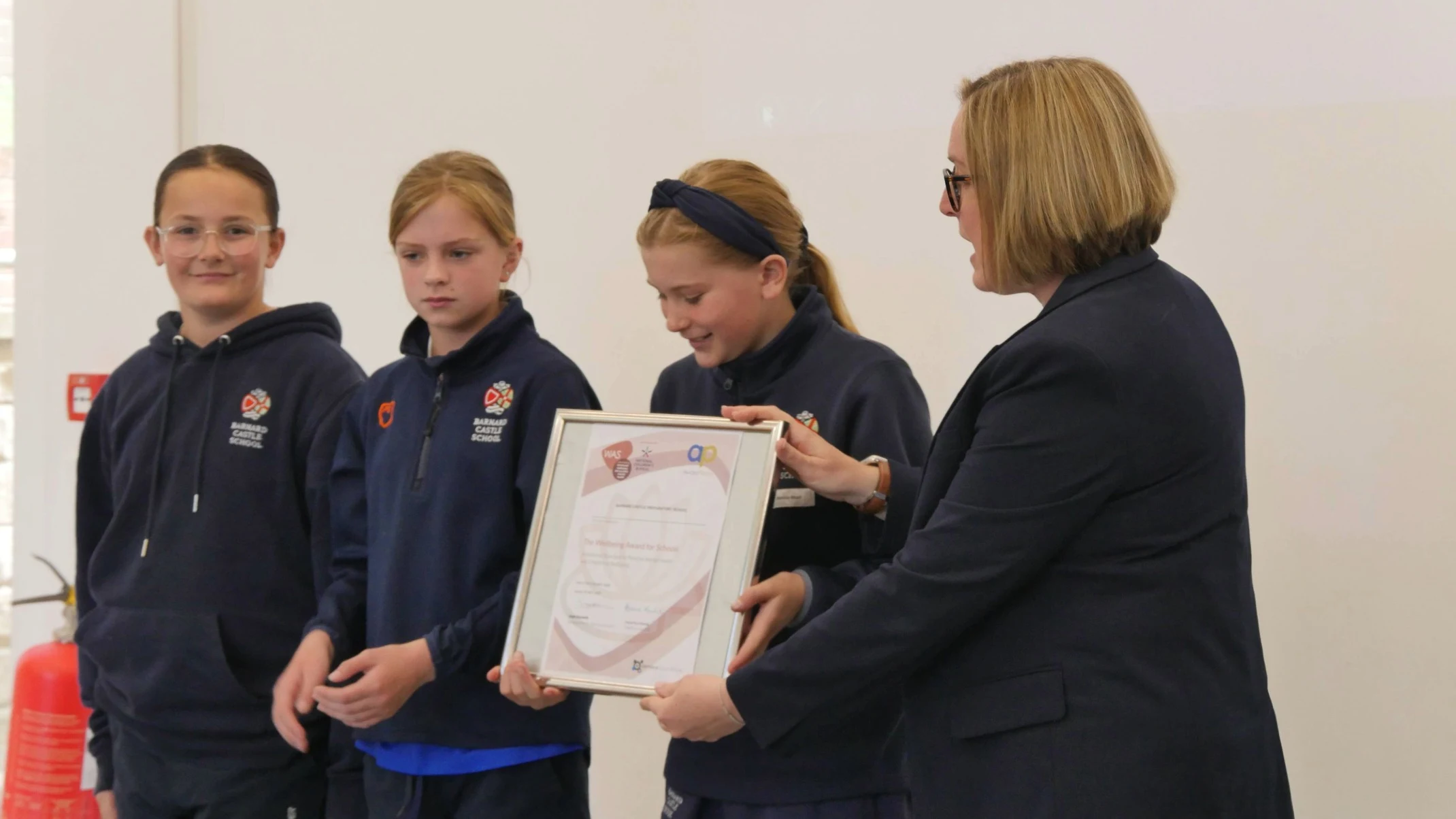 Barney Prep School students receiving an award.