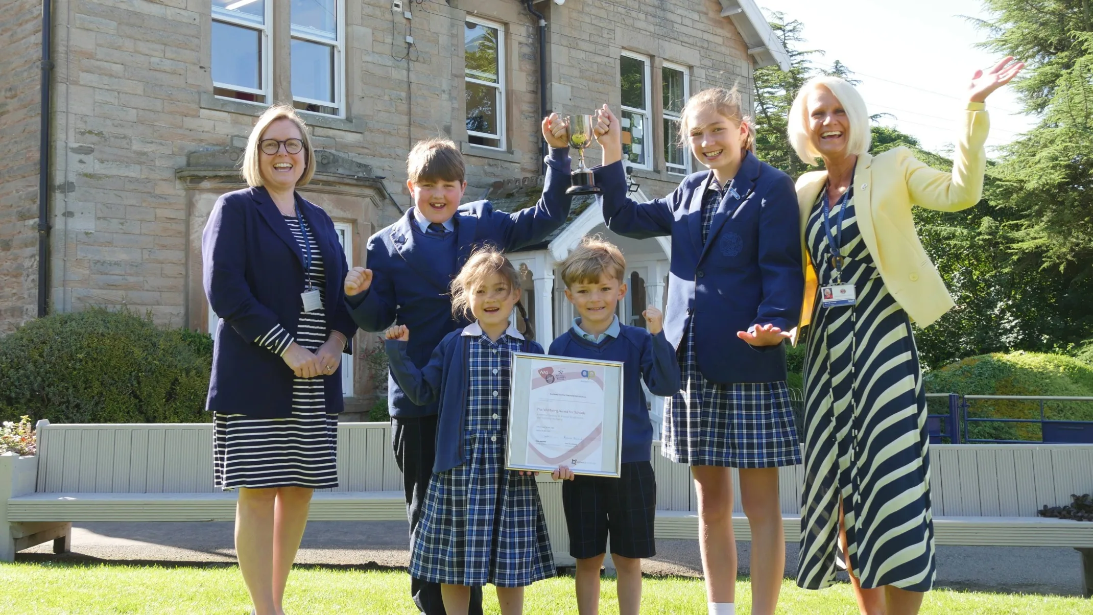 Barney Prep School students celebrate award win.