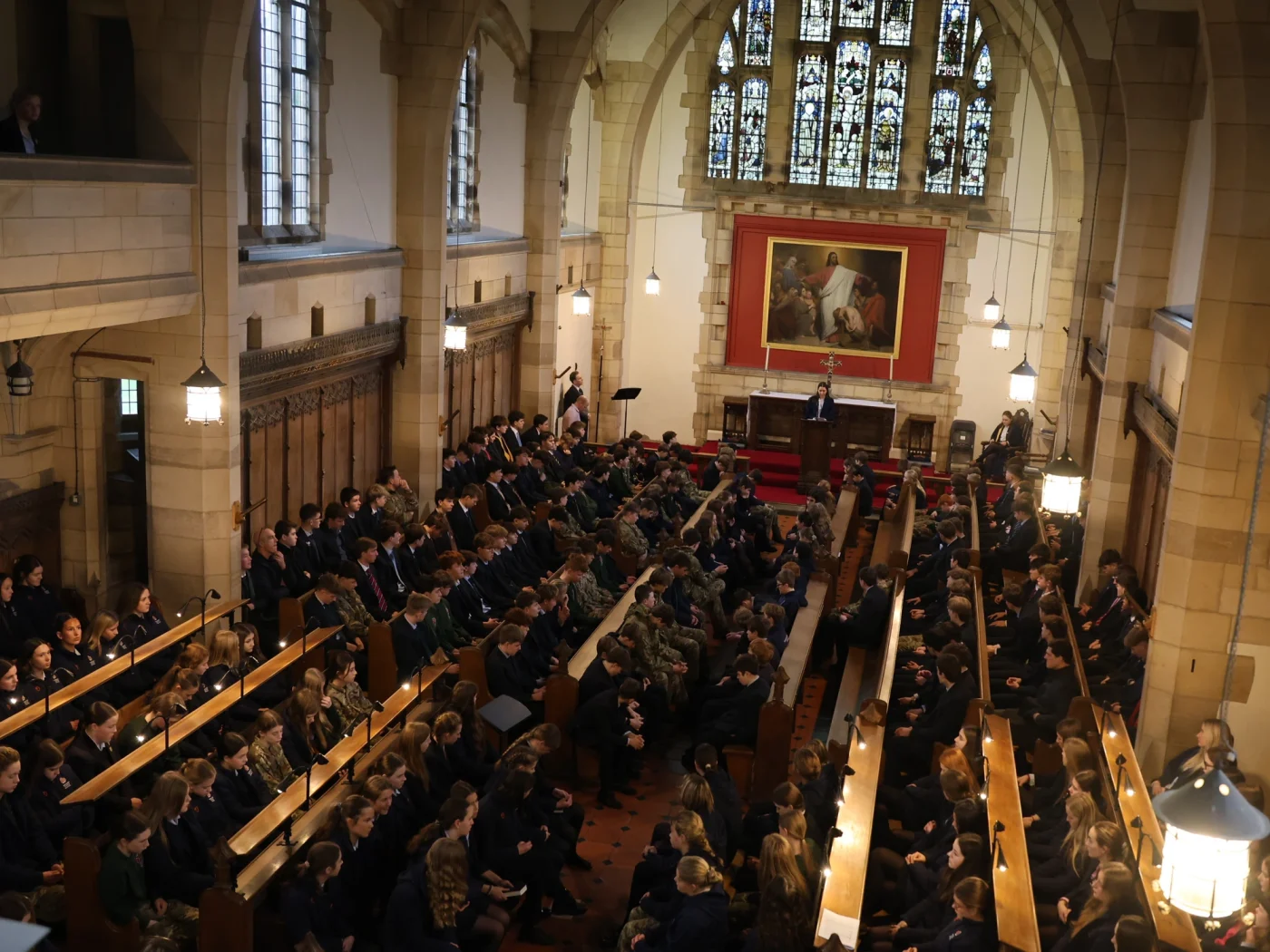 Full school assembly in ornate building at Barnard Castle School.