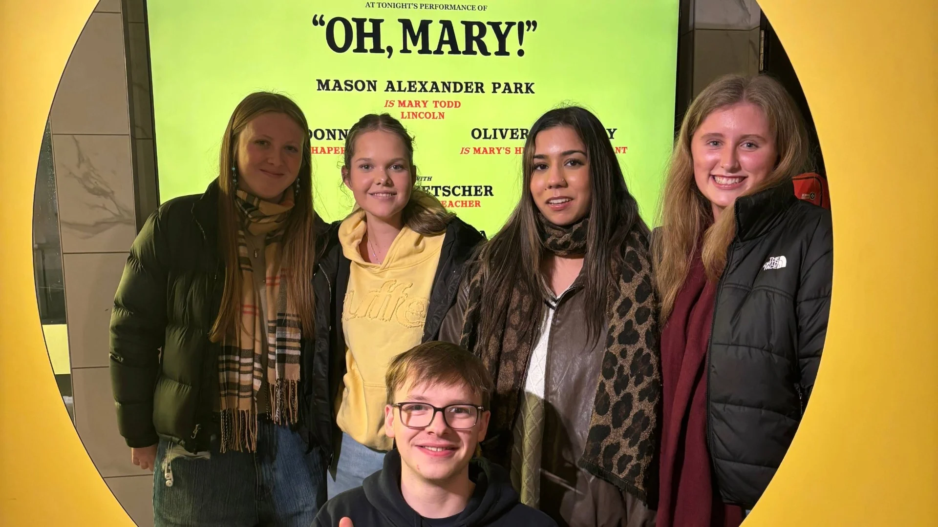 Barney Theatre students in a yellow cut-out for the play "Oh Mary!"