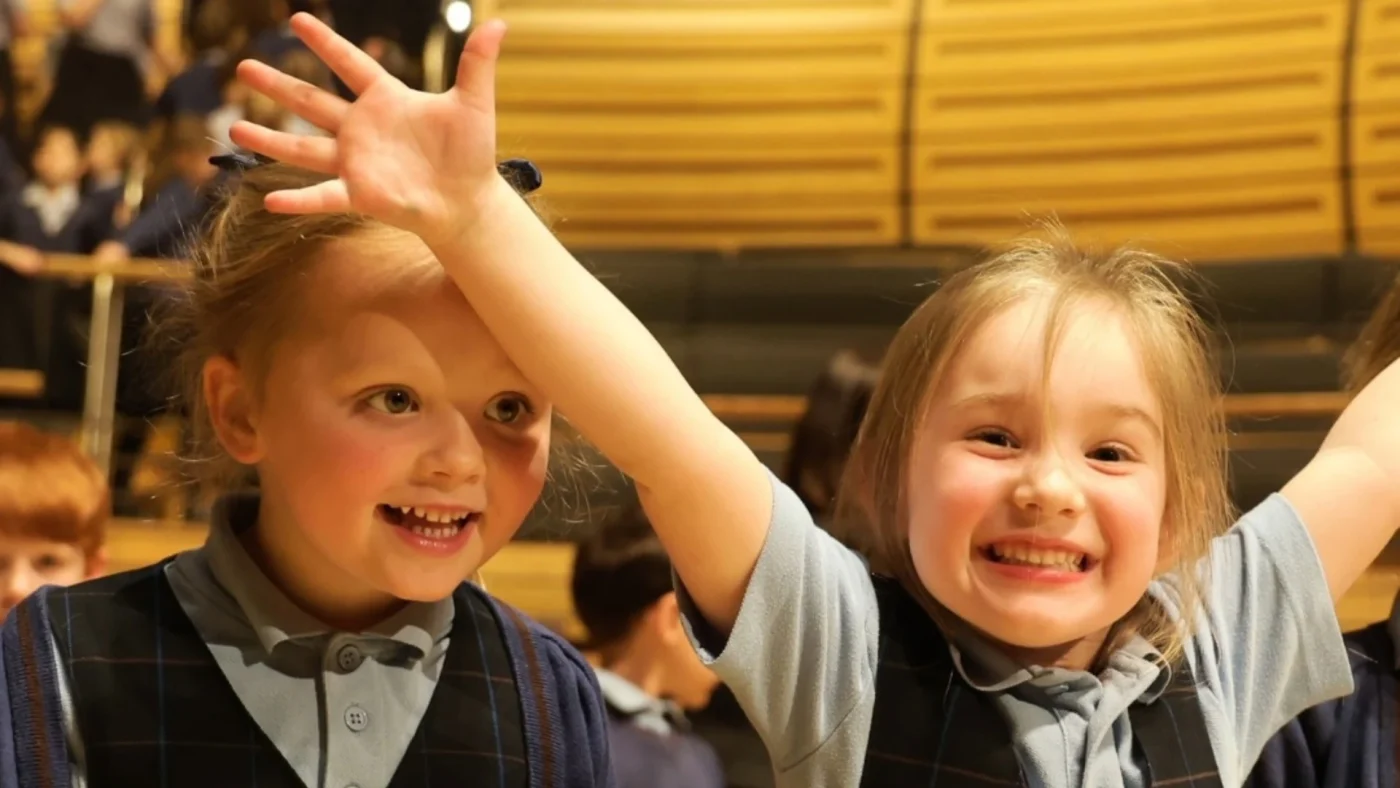 Two young Barney girls performing at The Glasshouse in Gateshead.