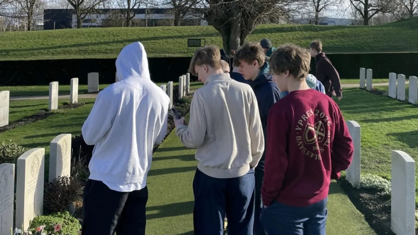 Barney students walk through a WW1 cemetery.