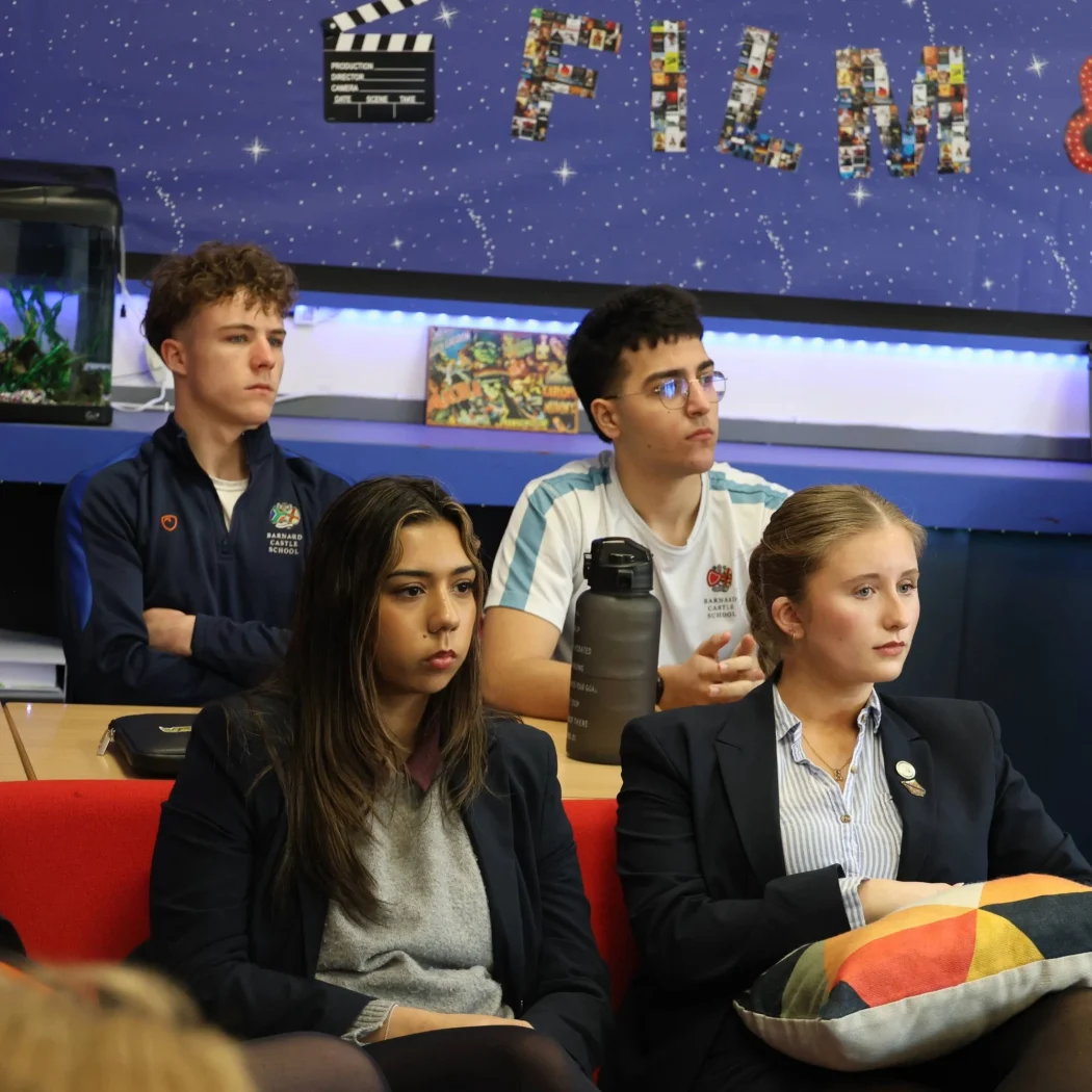 Four Barney Sixth Form students sitting in a lesson.