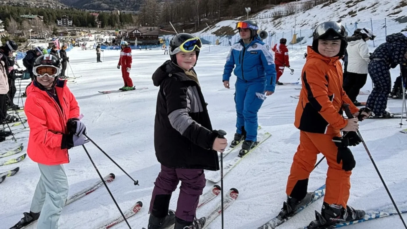 A group of Barney students with their skis.