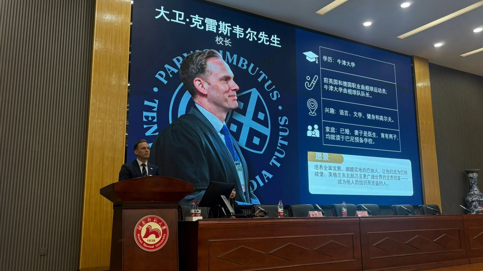 Barney Headmaster David Cresswell gives a presentation in China.