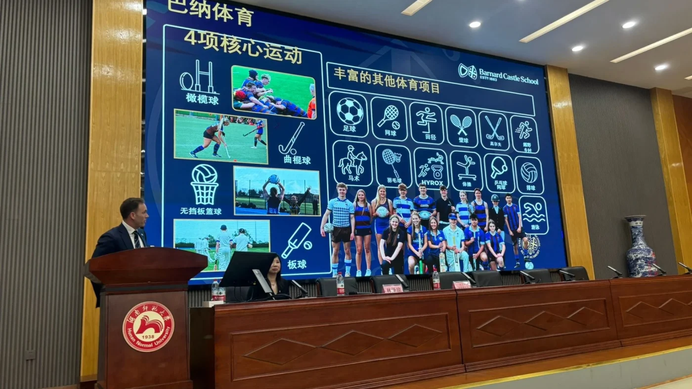 Barney Headmaster David Cresswell gives a presentation in China.