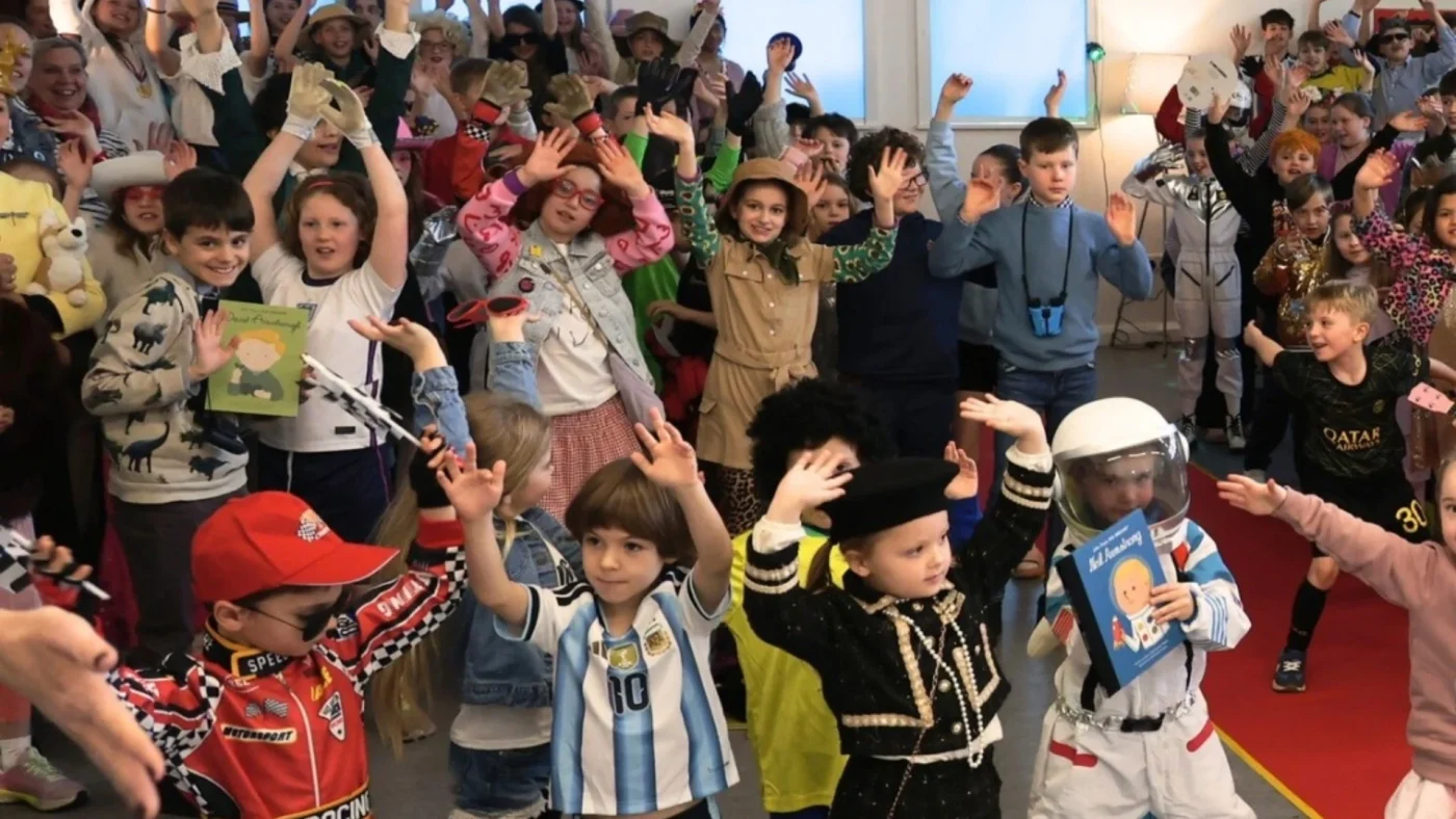 Barney Prep students dancing in fancy dress.