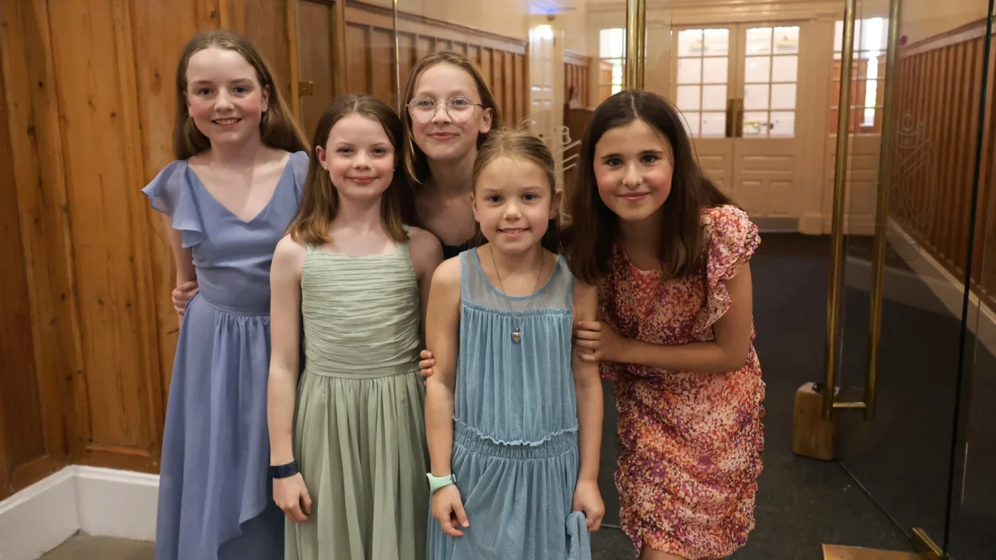 Young girls wearing dresses at the 2026 Longfield Dinner.