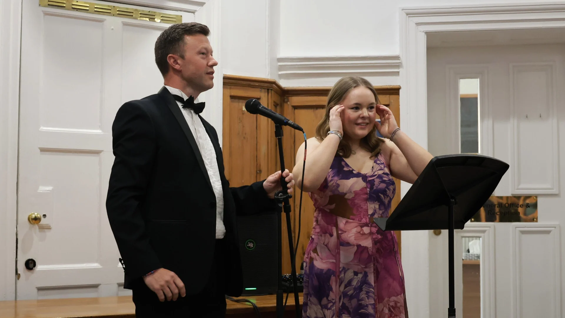 A Barney student and staff member speaking at the 2026 Longfield Dinner.