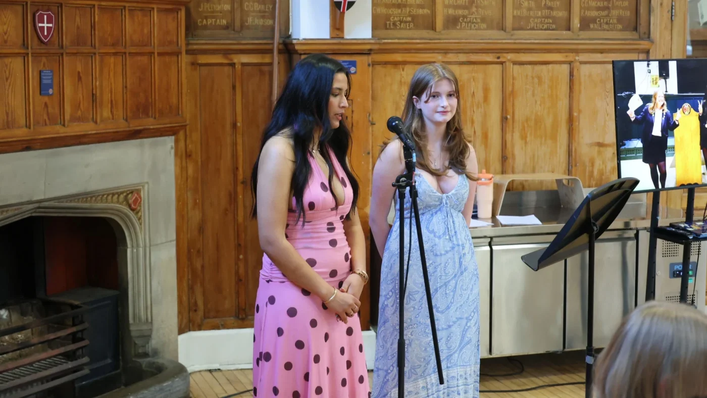 Two Longfield Girls’ Boarding House members singing.
