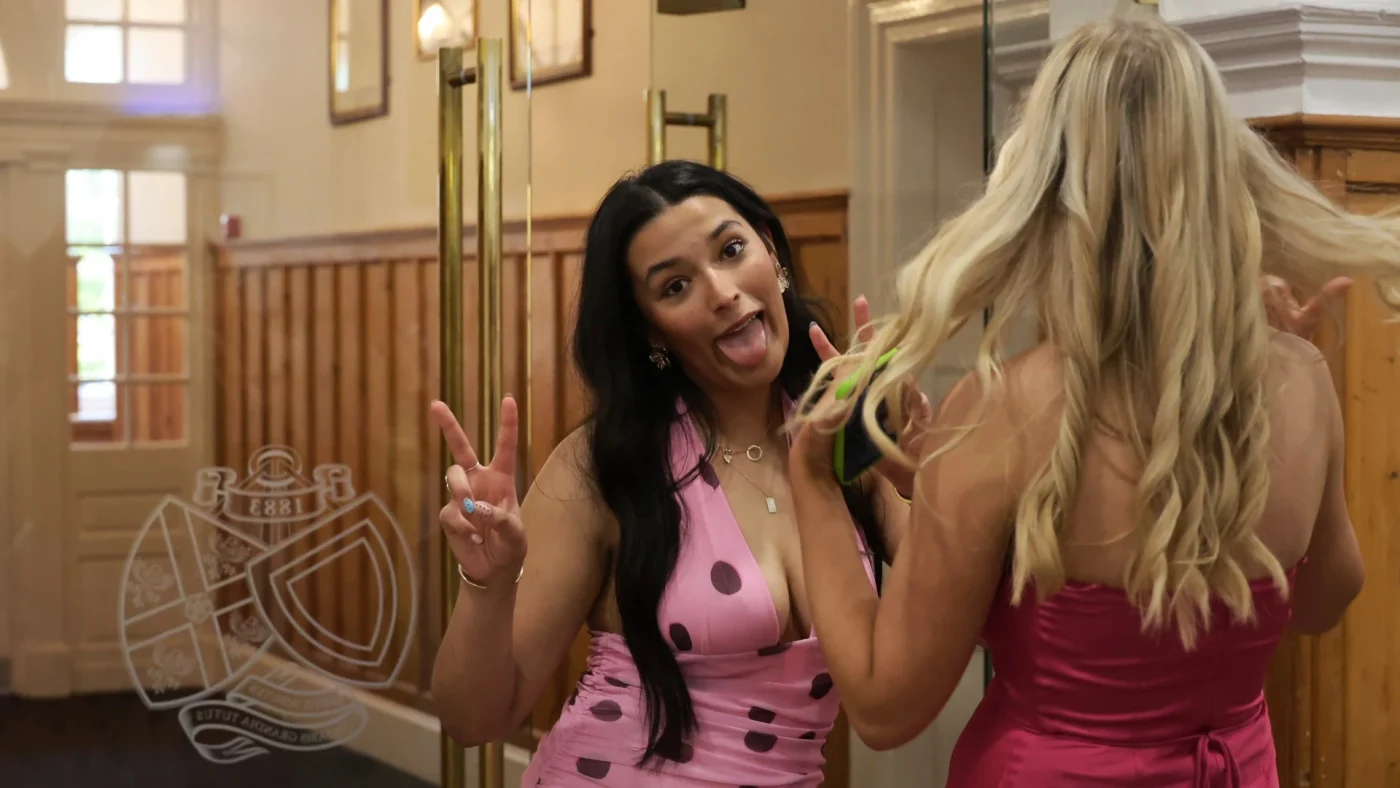 Longfield Girls’ Boarding House members joking together at the Longfield Dinner.