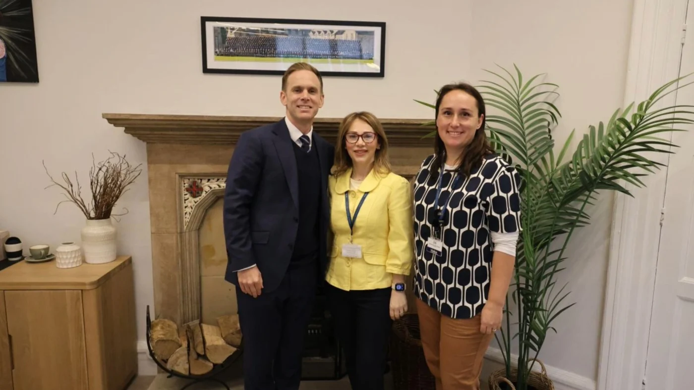 Ruth Benny and Lisa Kate Ackerman with Headmaster David Cresswell.