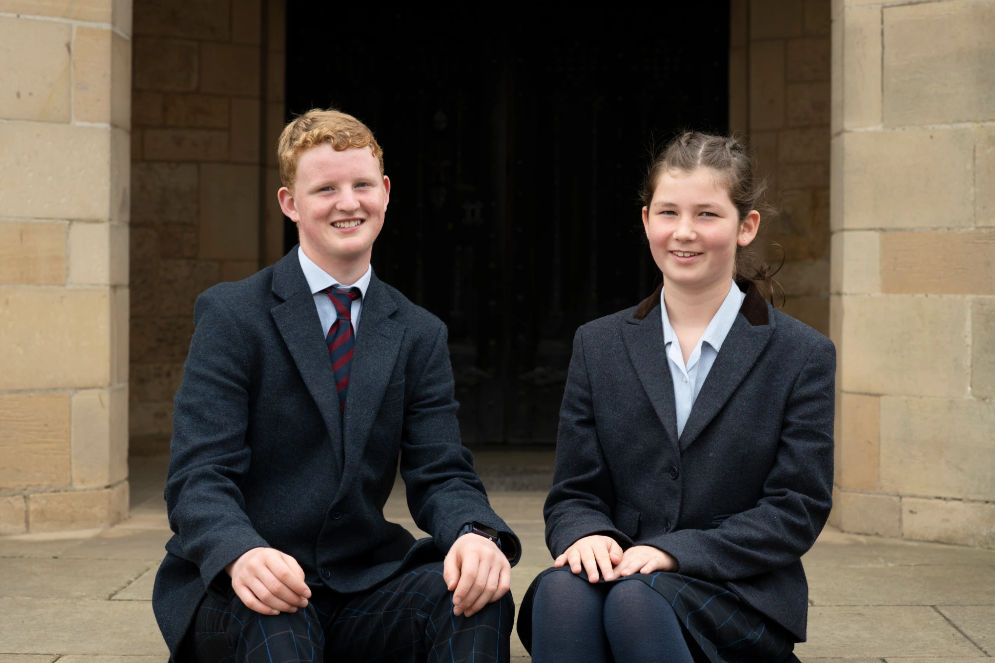 Two BCS students showcasing the Barnard Castle Uniform
