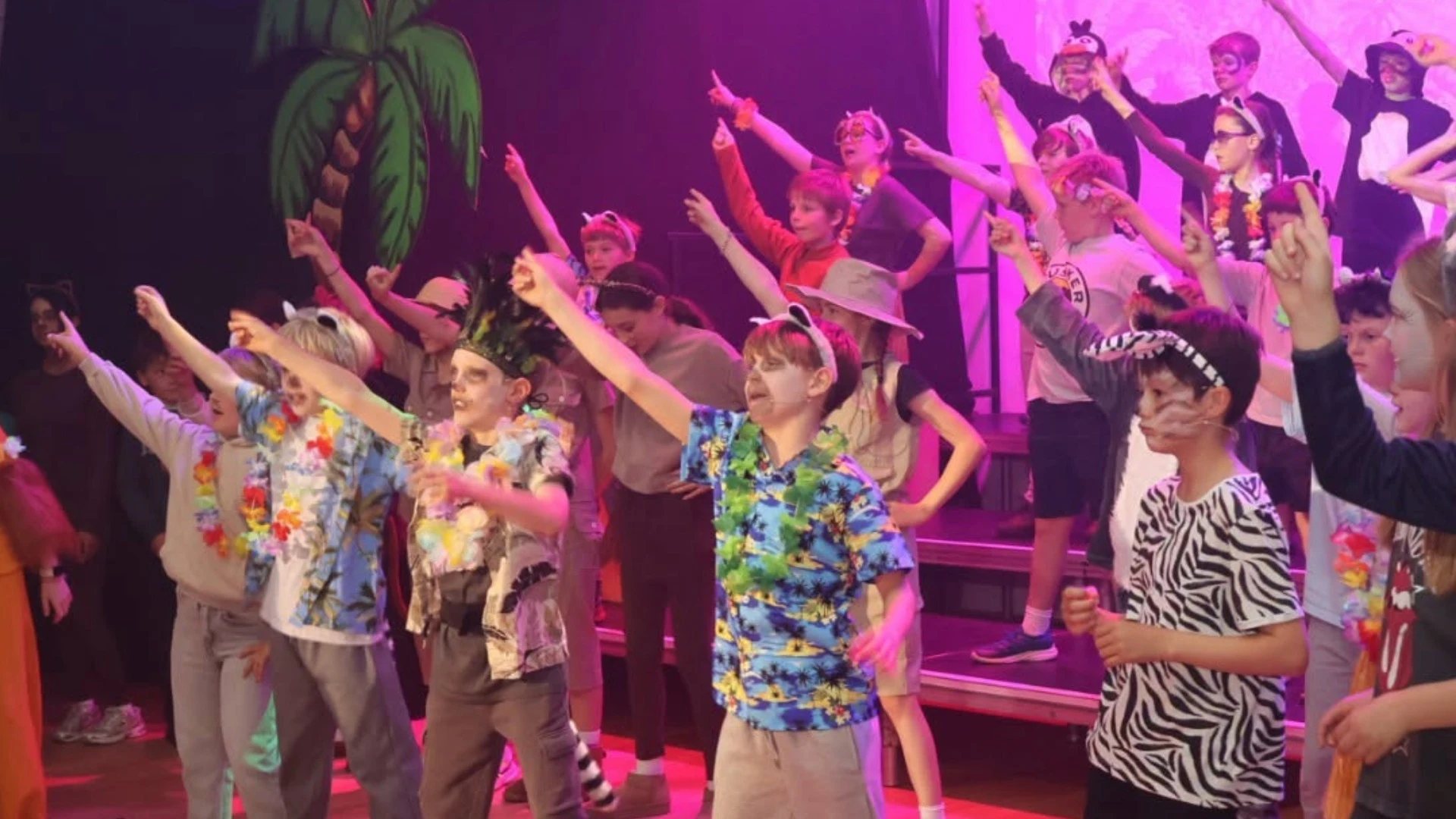Barney Prep School students performing a song in the Madagascar production.