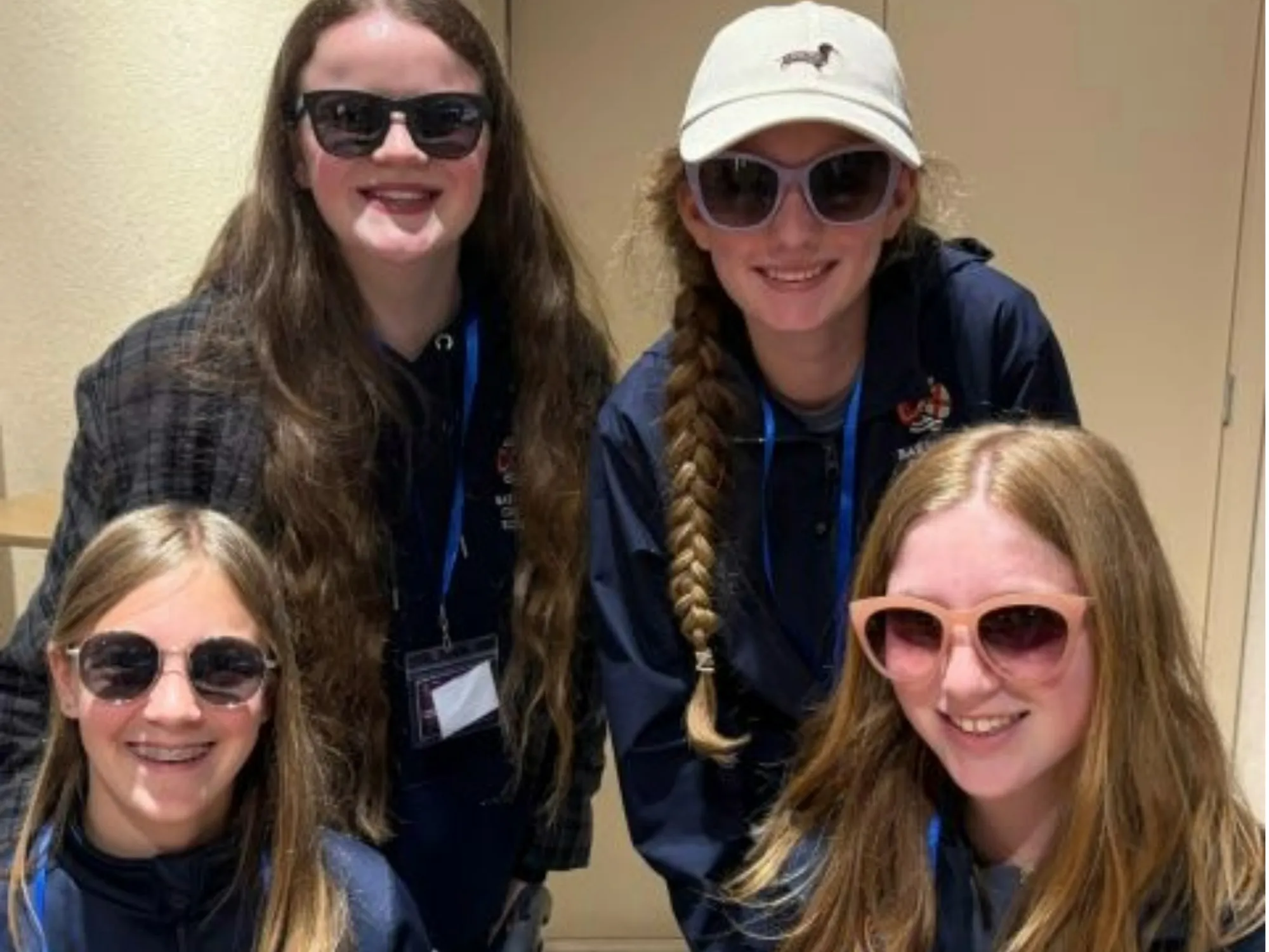barney students sporting sunglasses pose for a photo in Malaga.