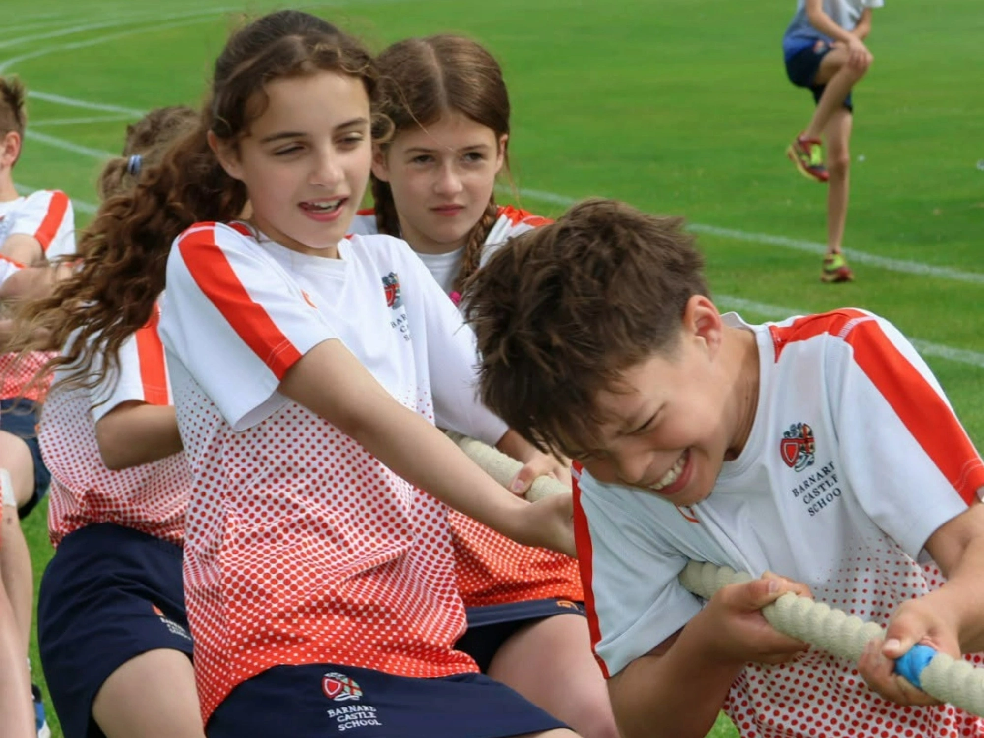 Prep School students partaking in tug of war during sports day.