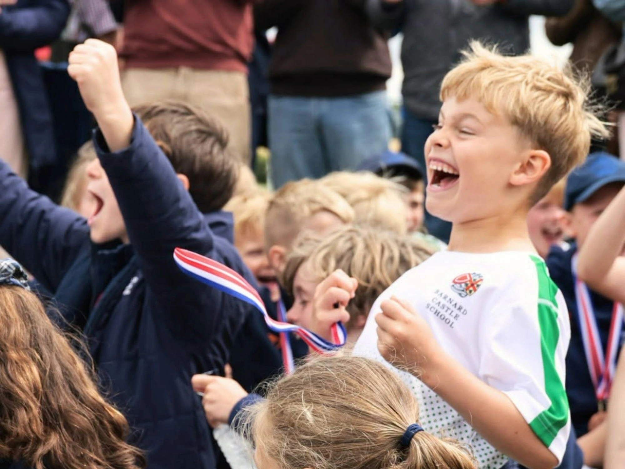 Prep School students cheering during sports day.
