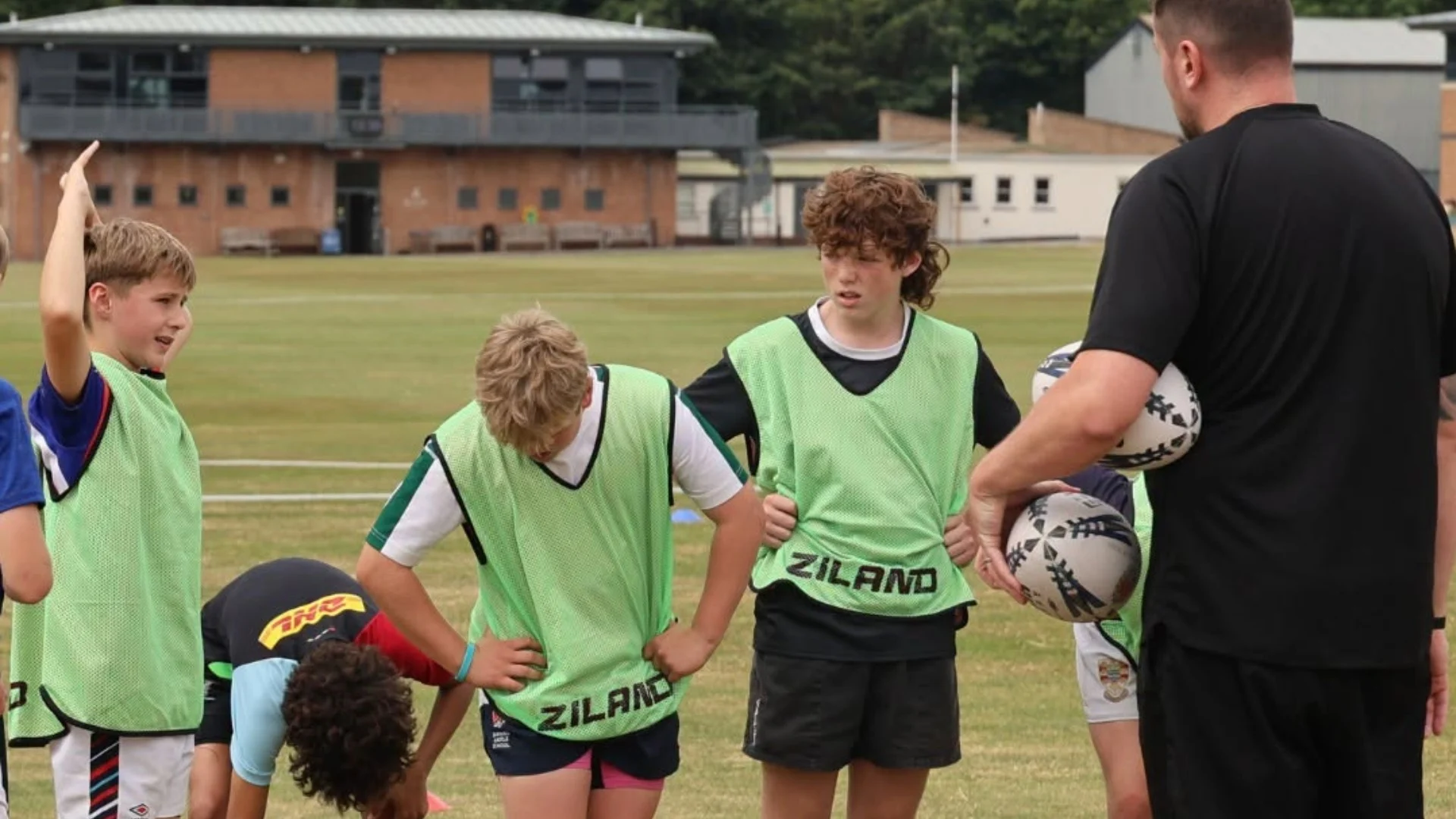 Students being instructed during this summer's Barney Rugby Academy.