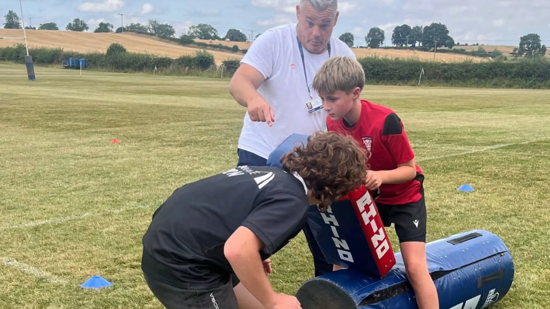 Students learning tackles during this summer's Barney Rugby Academy.