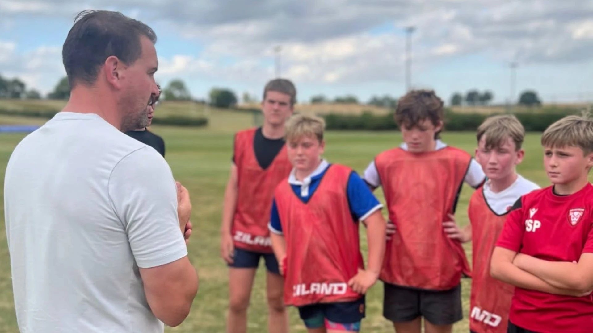 Students being instructed during this summer's Barney Rugby Academy.