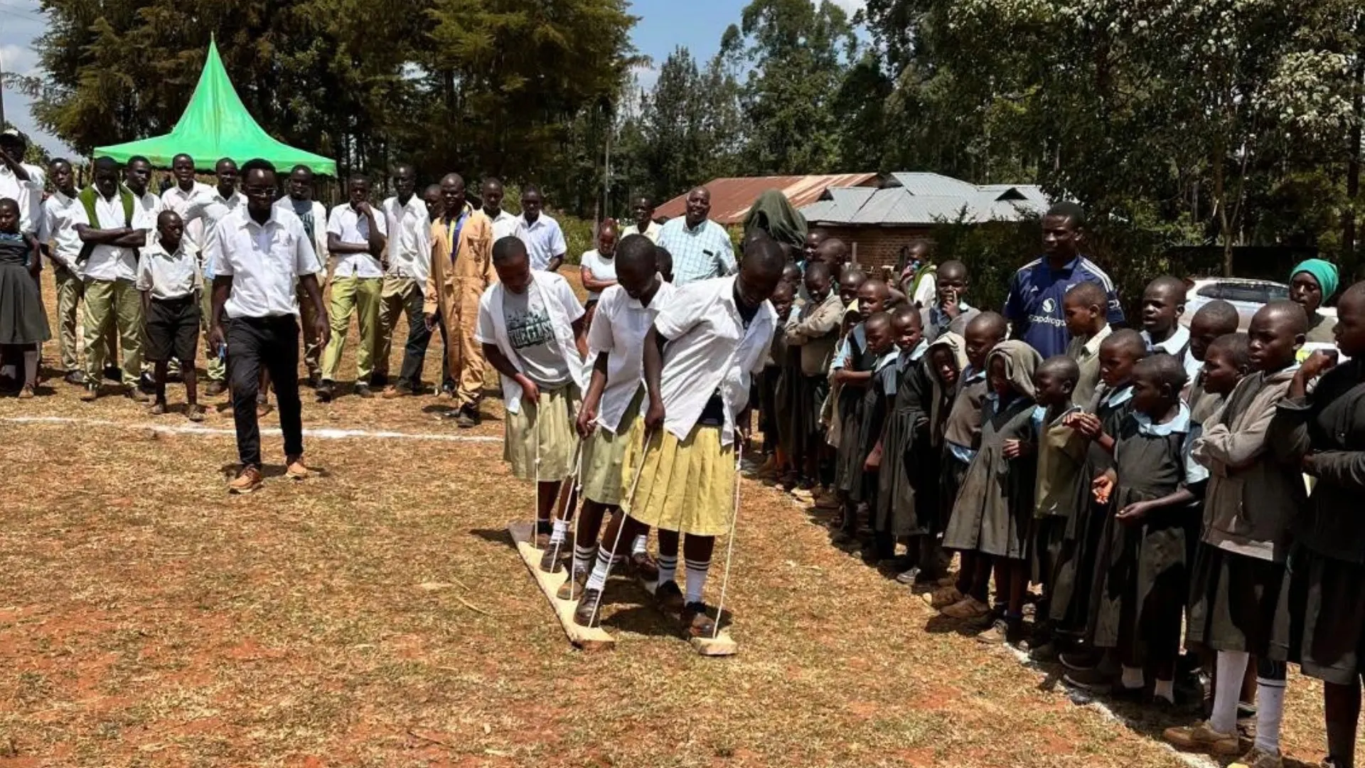 Locals playing sports during the 2026 Kenya expedition.