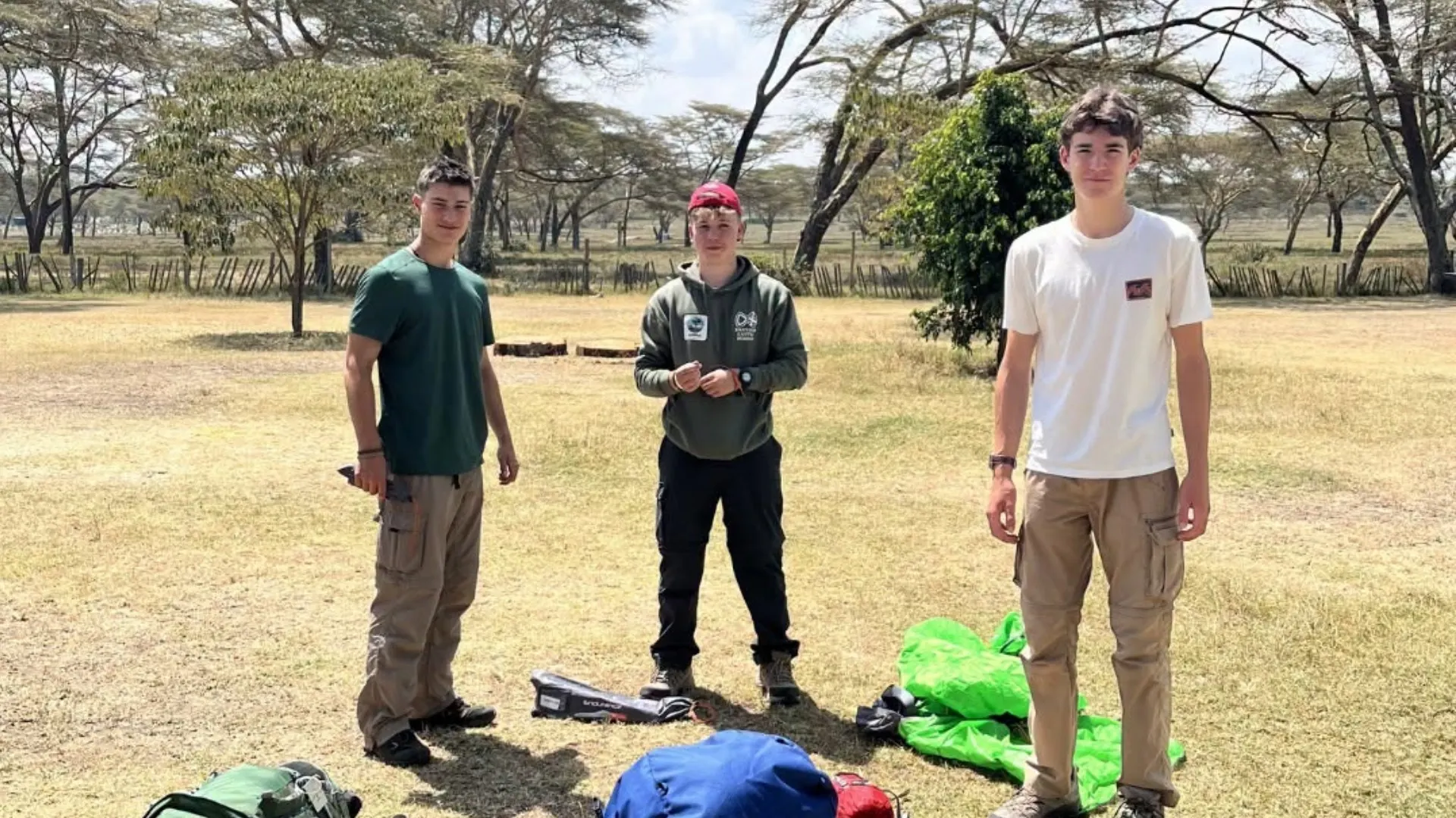 Barney students putting up a tent in Kenya.
