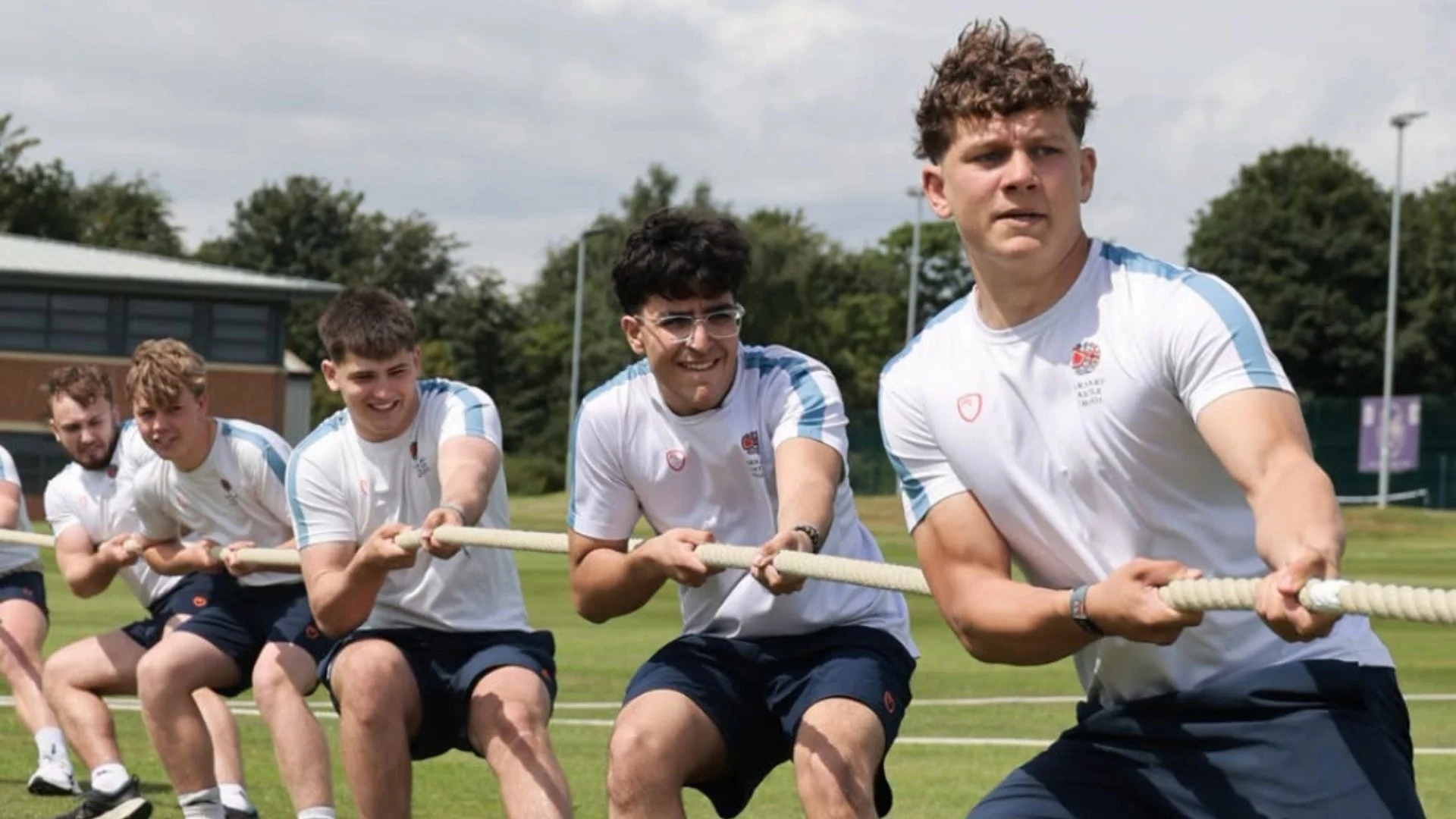 Senior boys playing tug of war.