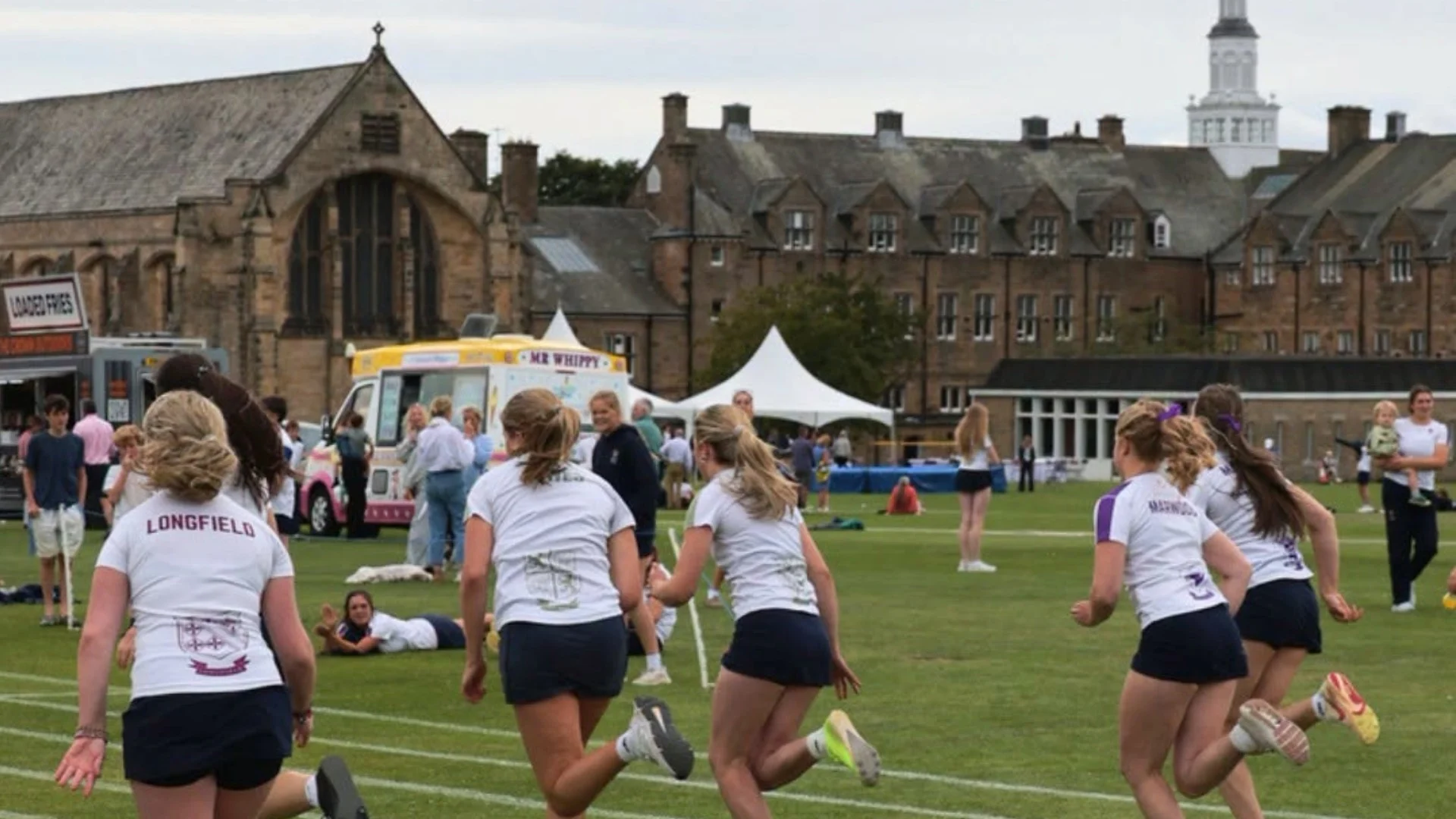 Girls running on Senior Sports Day.
