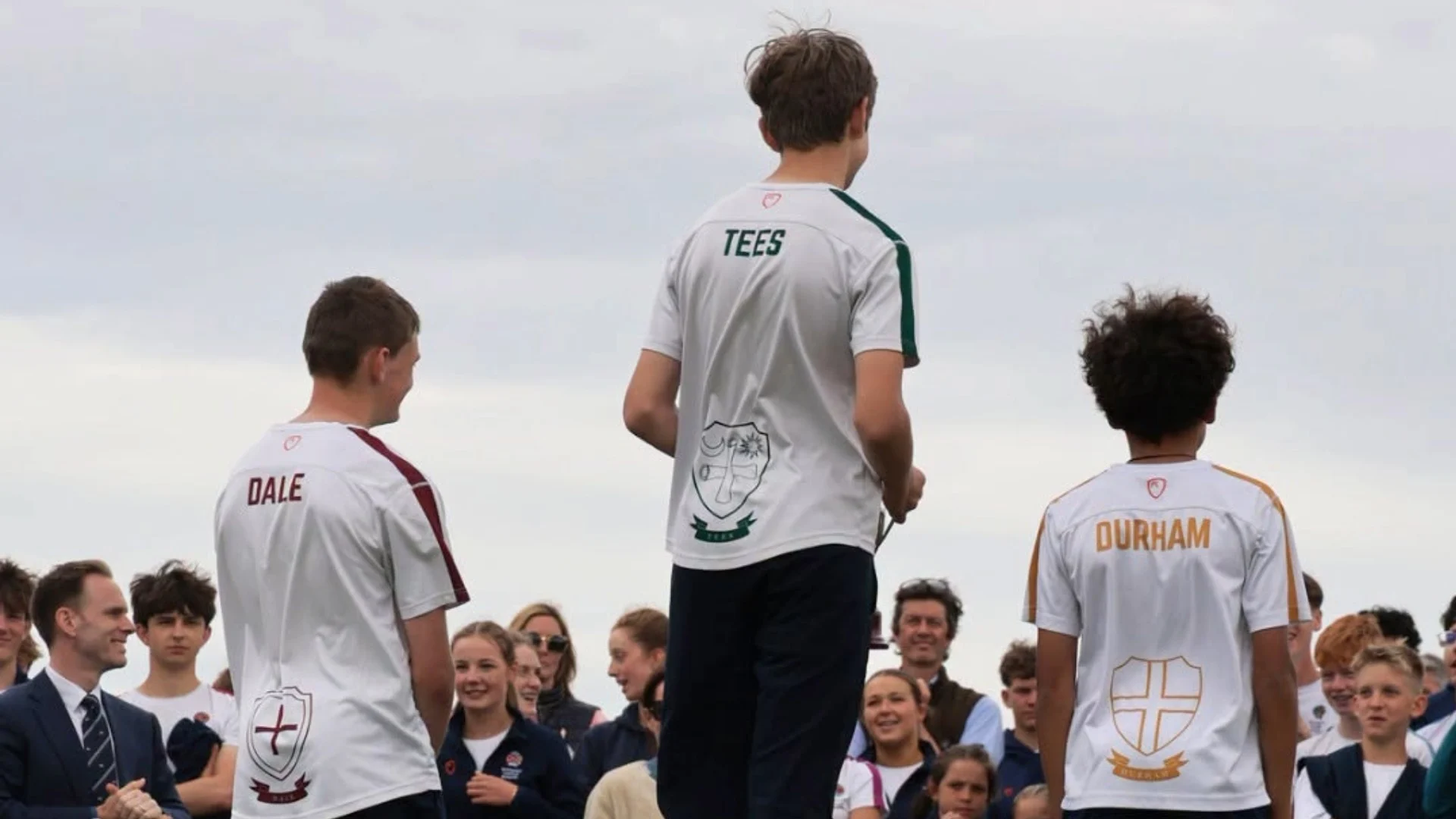 Senior boys standing on the podium on Senior Sports Day.