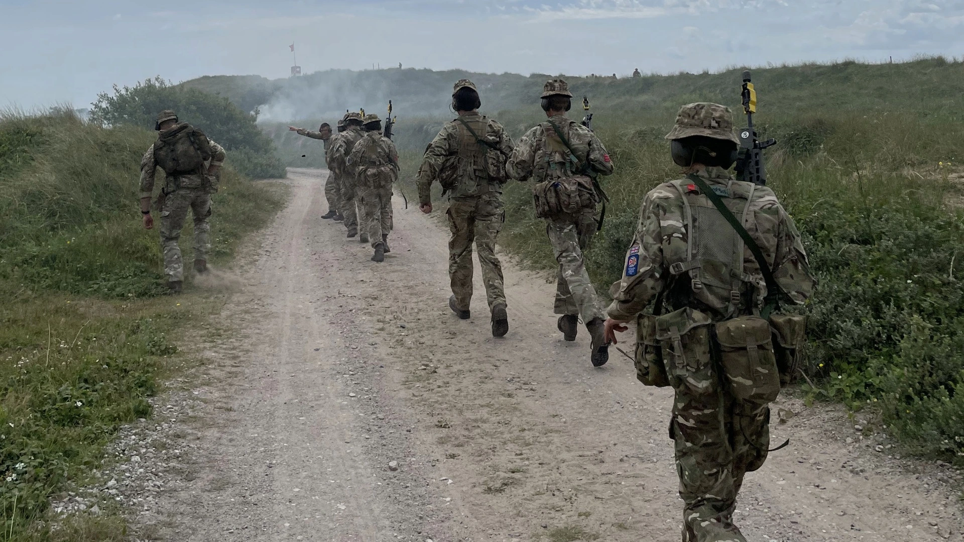 Barney CCF cadets walking down a dirt path.