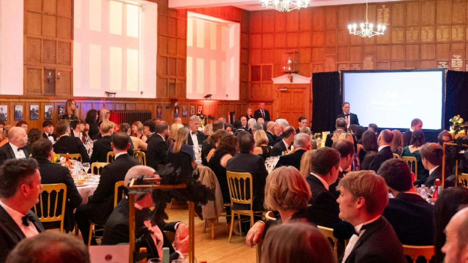 OBs, parents, and friends of the school dressed in formalwear and sat at tables.