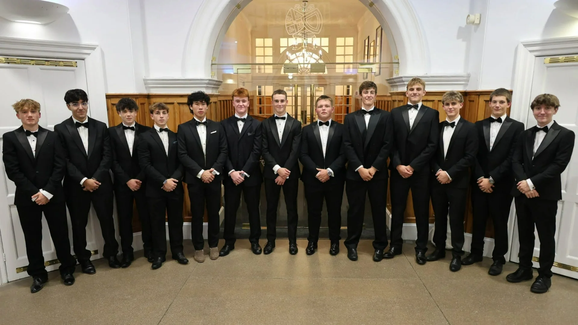 Barney Sixth Formers posed in tuxedos.