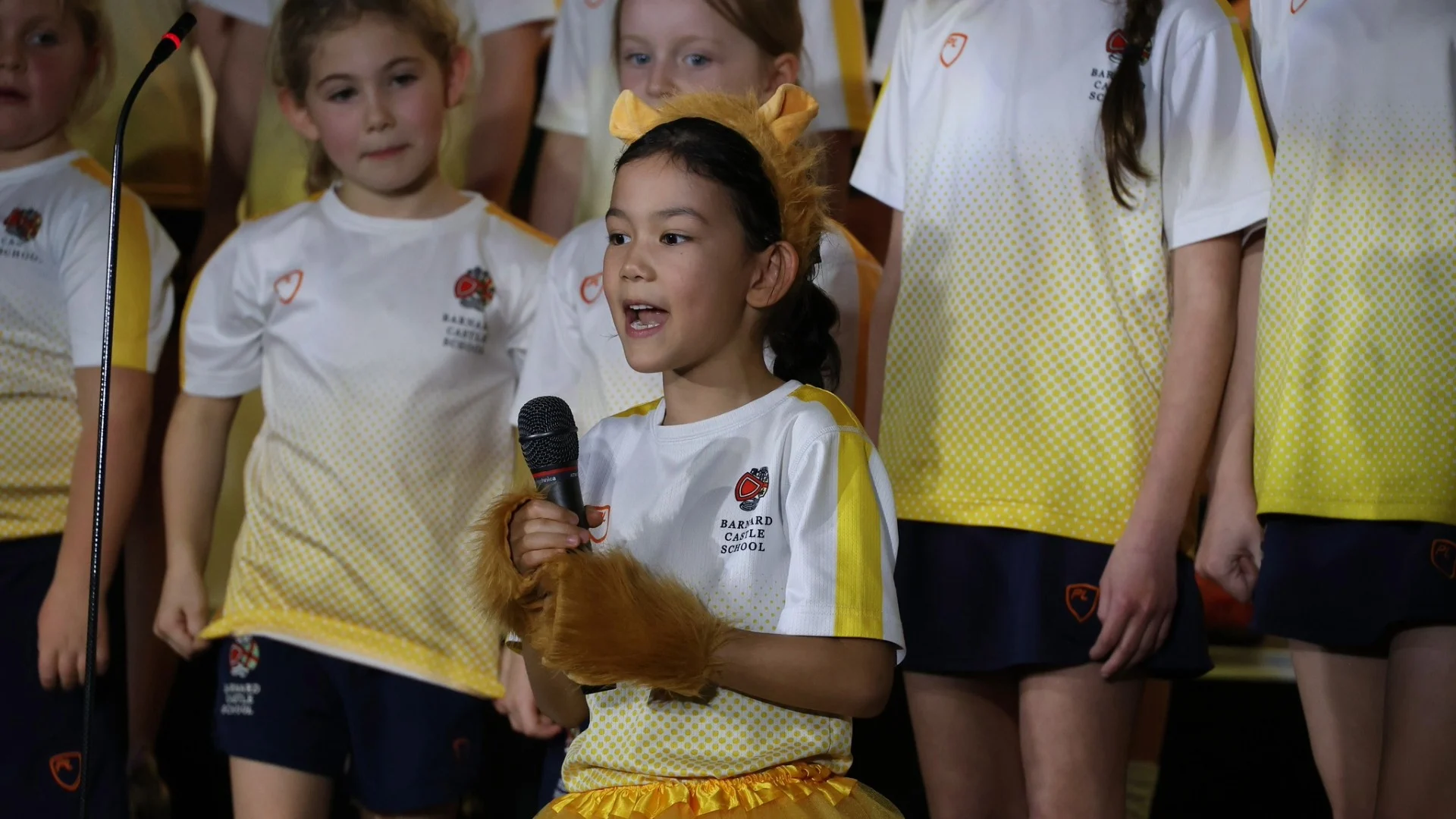 Barney Prep School students performing at House Singing 2026.